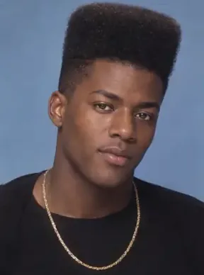 AI-generated portrait of a man with a tall flat-topped high-top fade and a gold chain